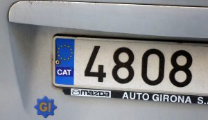 Separatists from the Spanish region of Catalonia often cover up the E (España) on their number plates with a CAT sticker